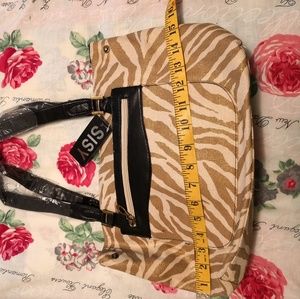 Women's fashion daily hand bag or shoulder bag
